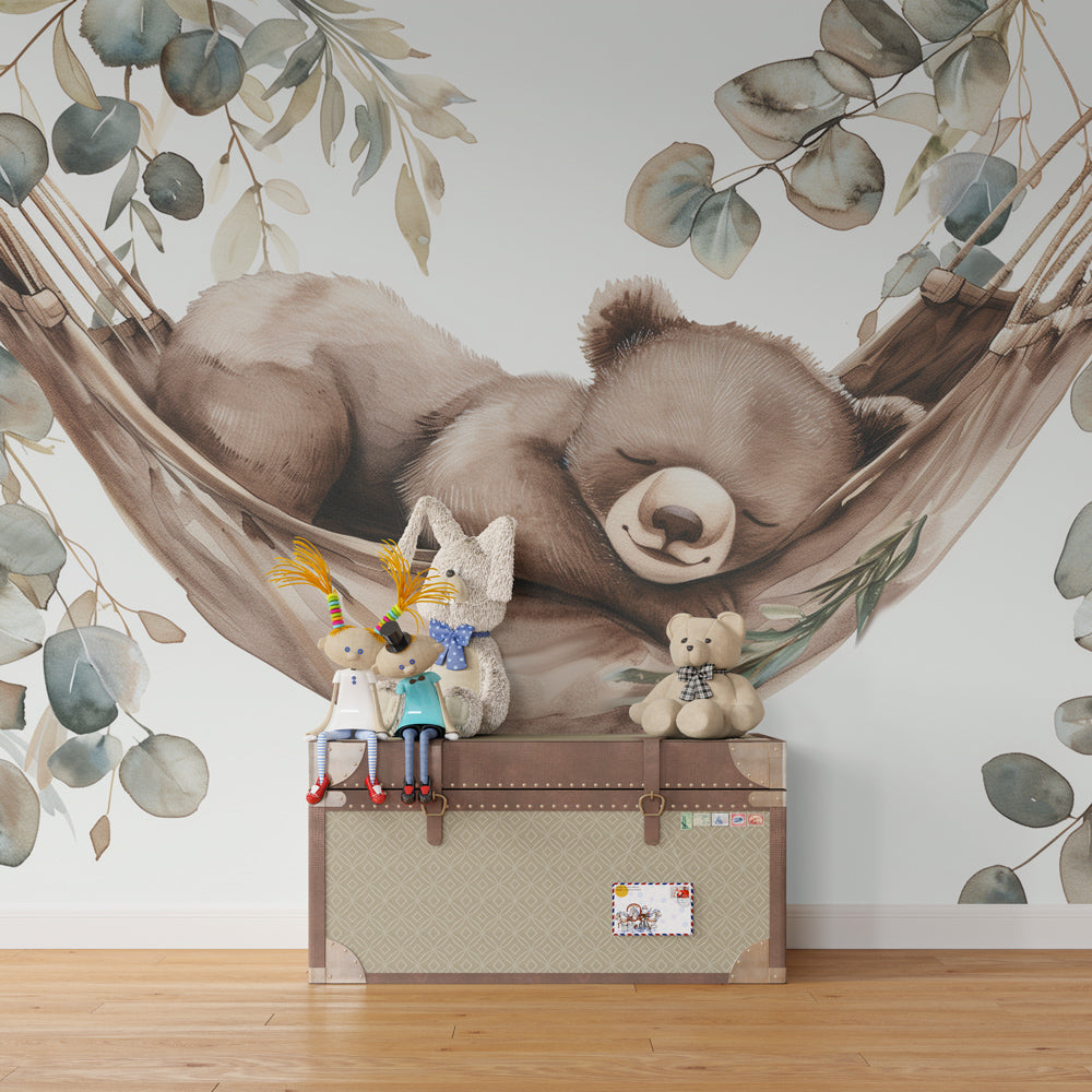 Sleeping bear hammock wallpaper in cozy kids bedroom with natural brown and green tones
