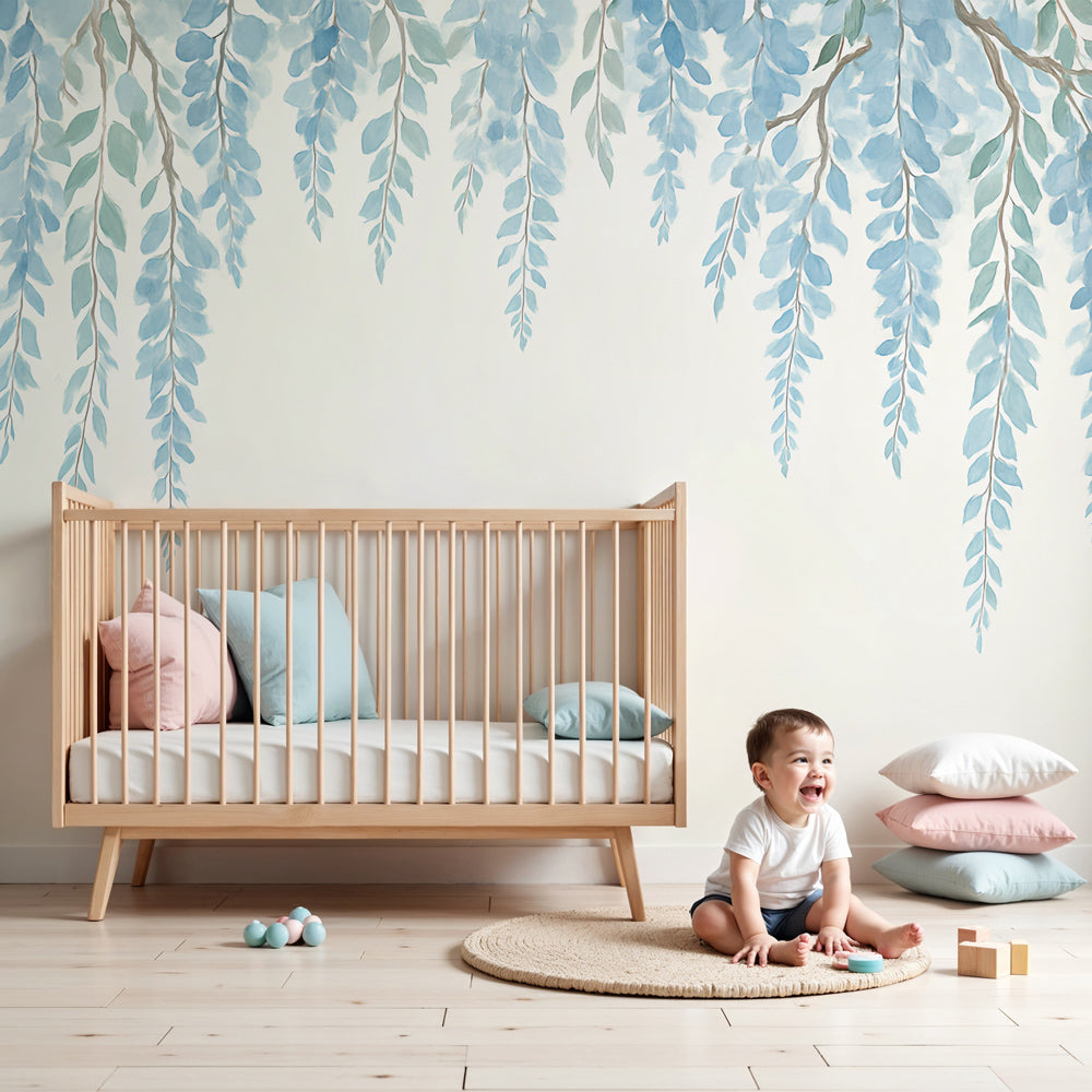 Blue leaves mural wallpaper creating serene nursery atmosphere with natural botanical design by Kids-Mundo