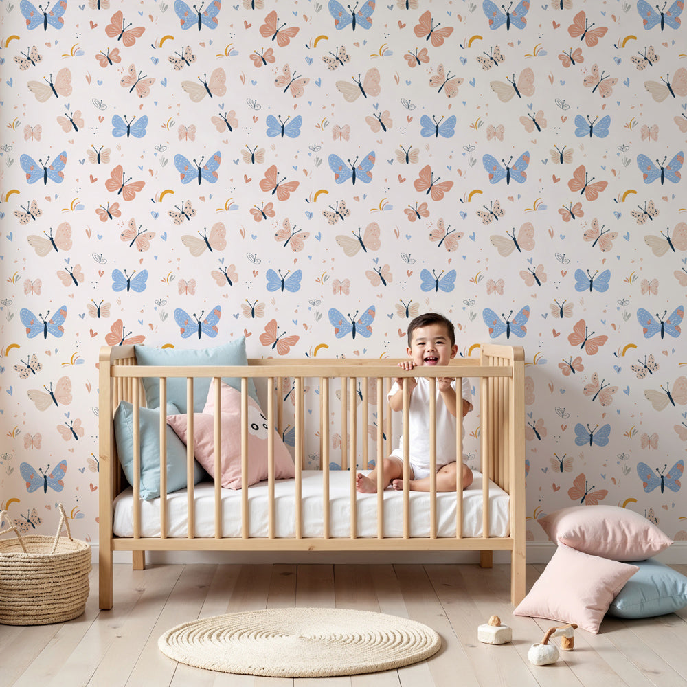 Pastel butterfly mural wallpaper creating magical nursery decor with soft pink and blue tones by Kids-Mundo