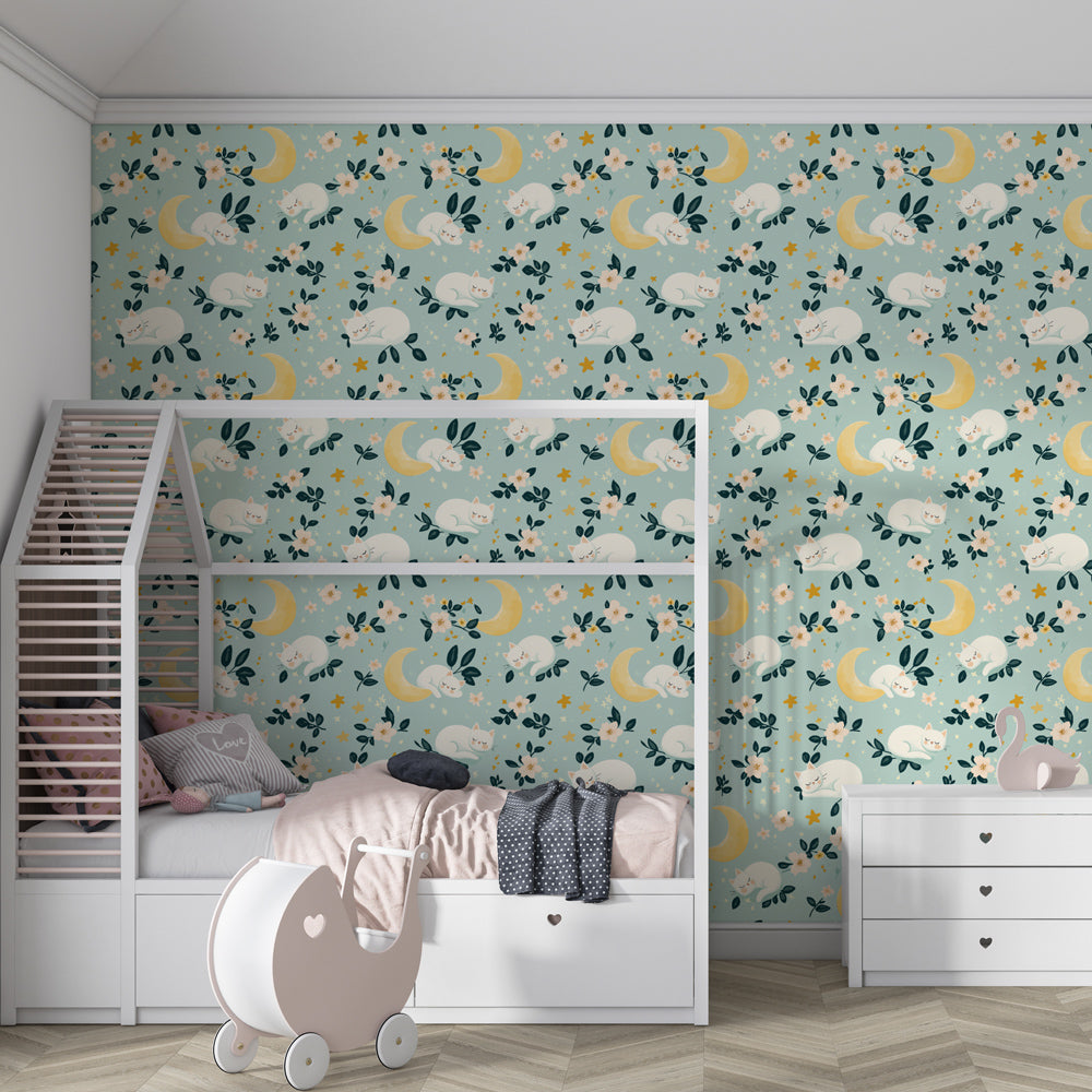 Peaceful cat wallpaper creating serene nursery atmosphere with blue tones and celestial motifs