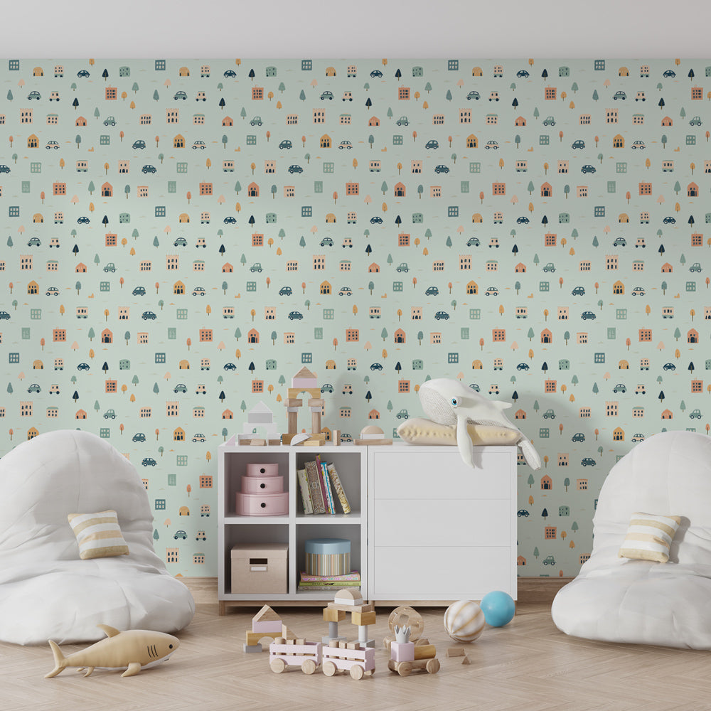 Urban themed children's bedroom featuring city mural wallpaper with houses and vehicles
