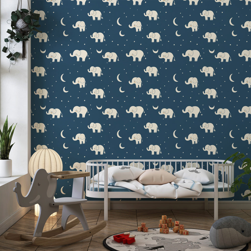 Children's elephant wallpaper with moon and stars creating magical bedroom atmosphere