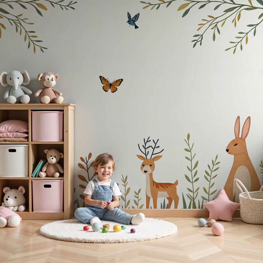 Enchanted forest mural wallpaper with woodland animals decorating a serene nursery by Kids-Mundo
