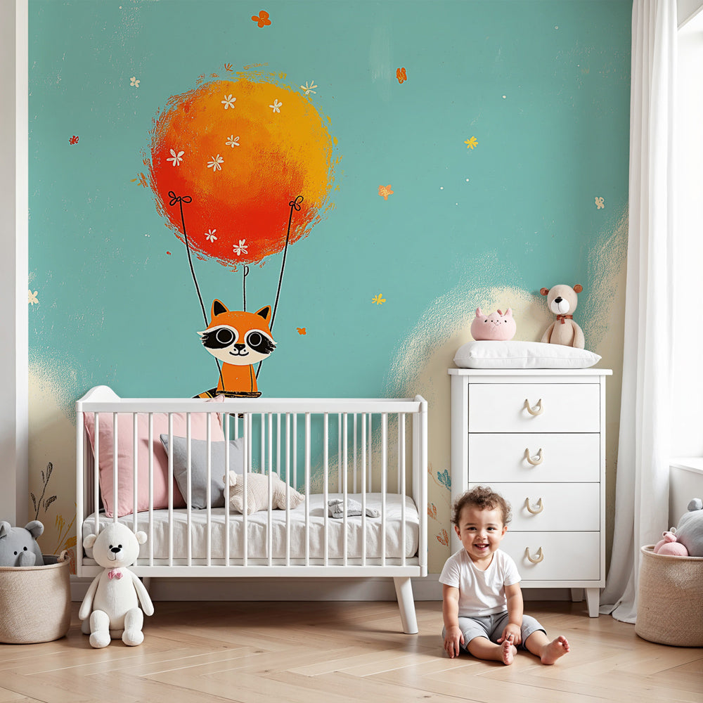 Flying raccoon mural wallpaper in modern baby nursery with soft blue sky and colorful balloon by Kids-Mundo