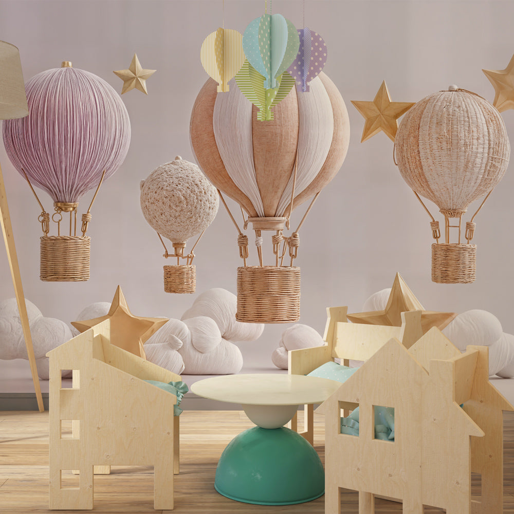 Children's bedroom featuring hot air balloon wallpaper with golden stars and fluffy clouds decor