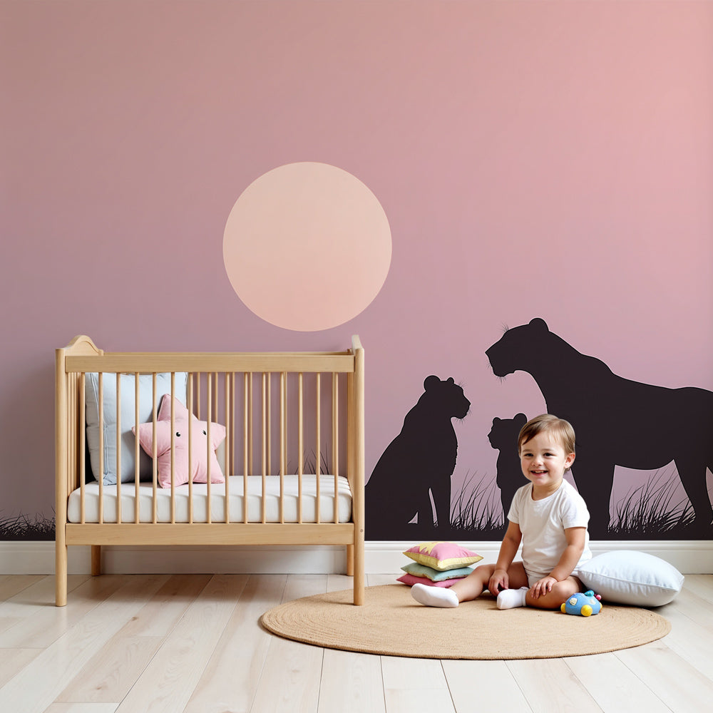 Lion family mural wallpaper creating safari-themed nursery with sunset colors by Kids-Mundo