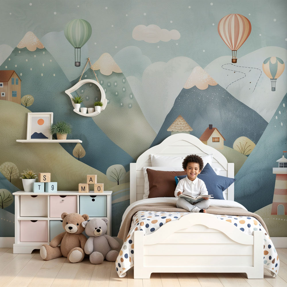 Mountain hot air balloon mural wallpaper in cozy nursery setting by Kids-Mundo