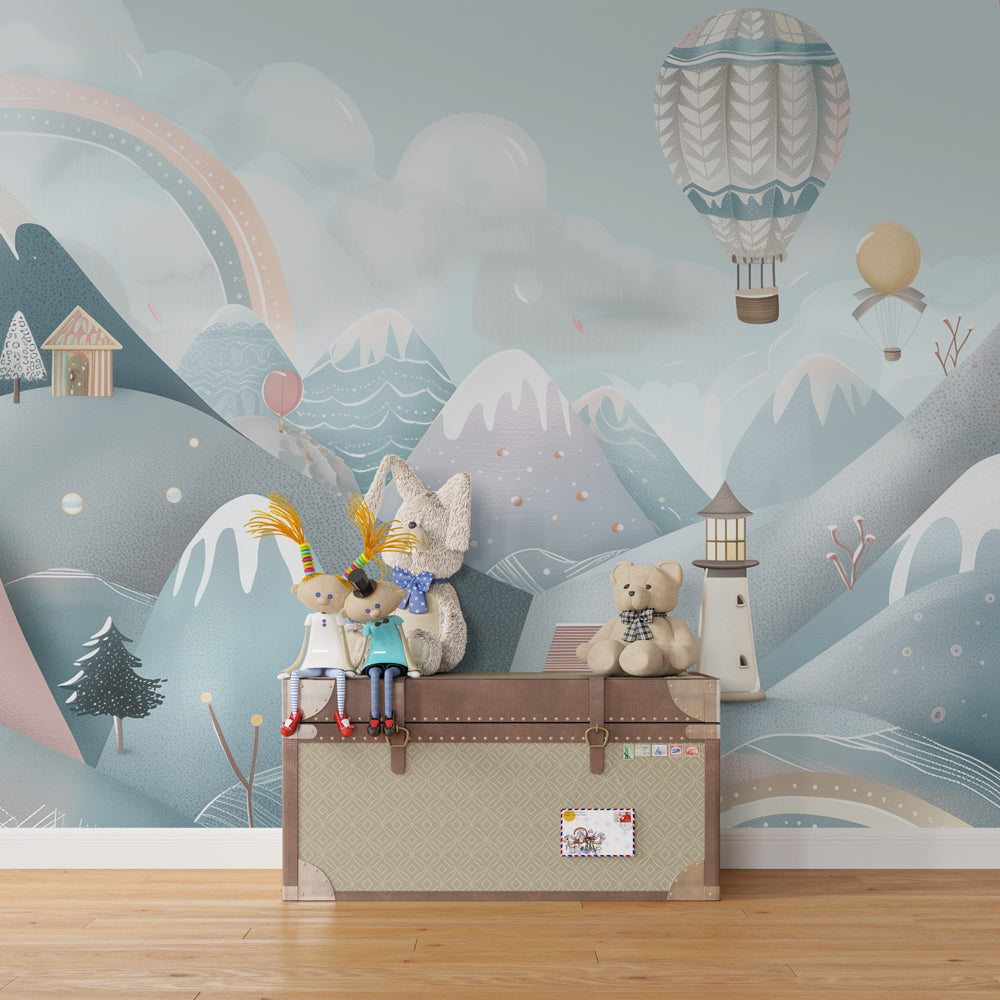Snowy mountain wallpaper creating dreamy nursery decor with colorful hot air balloons