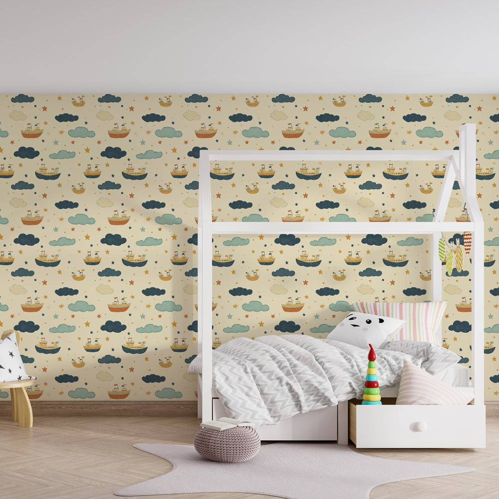 Nautical sailboat wallpaper creating dreamy maritime atmosphere in children's bedroom