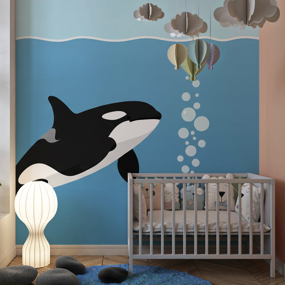 Underwater themed mural wallpaper creating calming kids bedroom atmosphere with marine life
