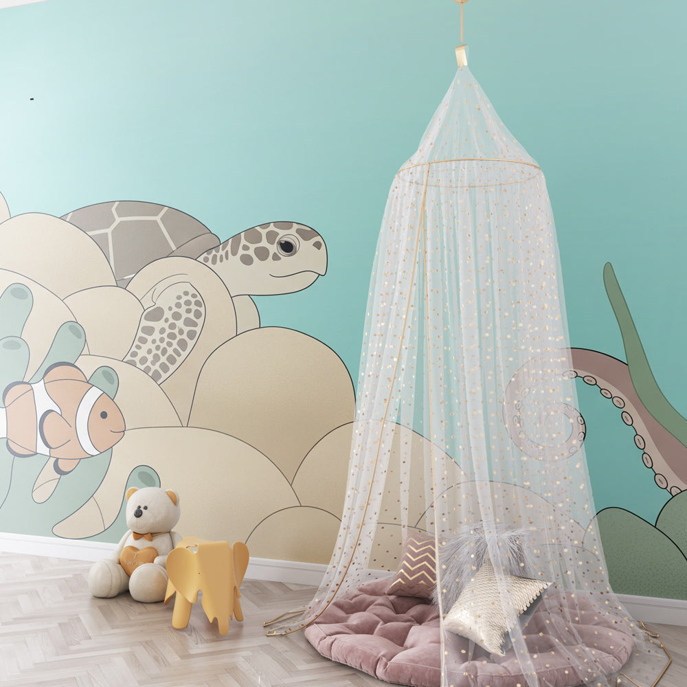 Underwater themed mural wallpaper creating calming kids bedroom decor with marine life