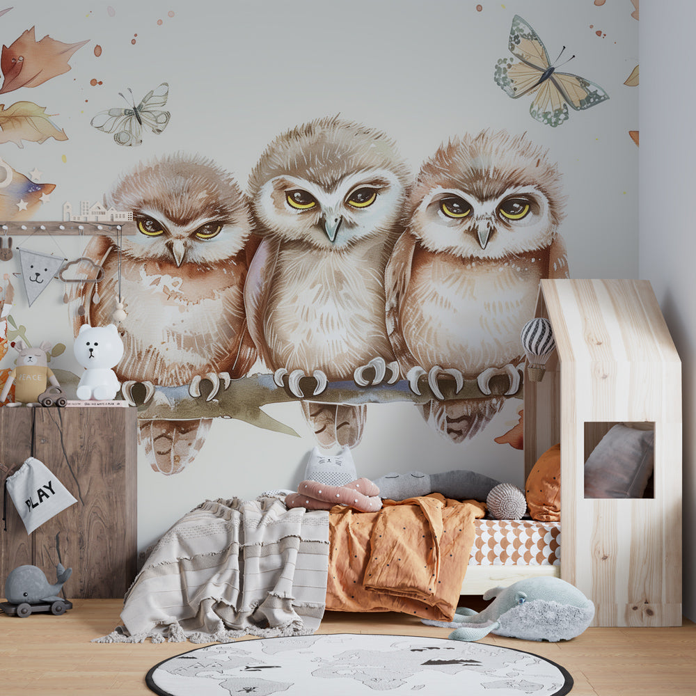 Woodland owls mural wallpaper with butterflies decorating modern toddler bedroom