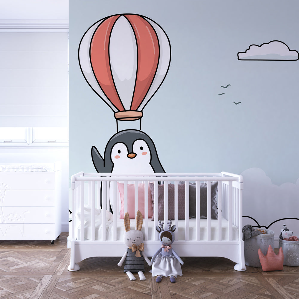 Children's bedroom featuring penguin hot air balloon mural wallpaper creating dreamy atmosphere