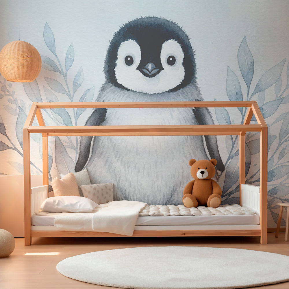 Cute penguin mural wallpaper creating peaceful marine atmosphere in children's bedroom