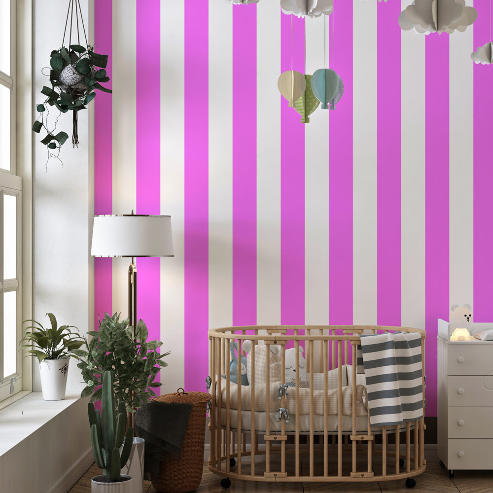 Bright pink vertical stripes wallpaper creating cheerful nursery decor with playful atmosphere