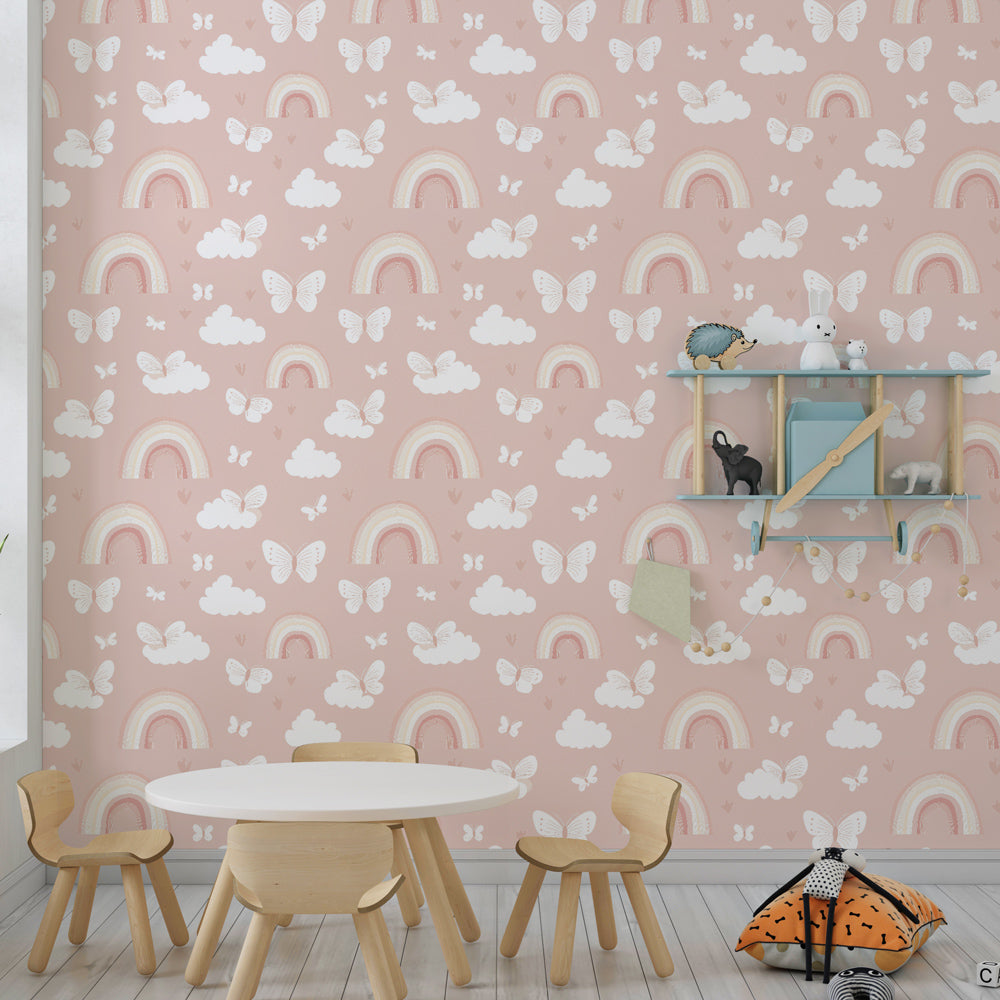 Whimsical rainbow and butterfly wallpaper creating magical atmosphere in kids bedroom with pink accents