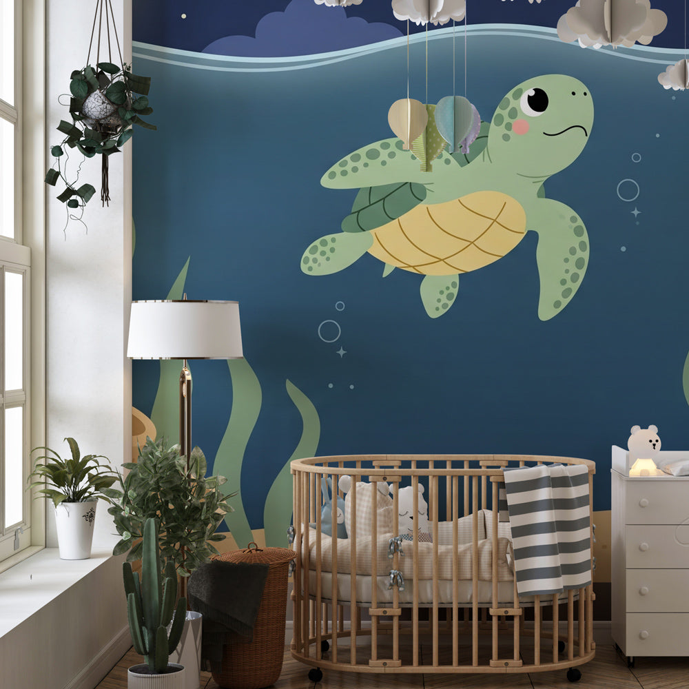 Underwater ocean mural wallpaper with swimming turtle in calming blue nursery decor setting