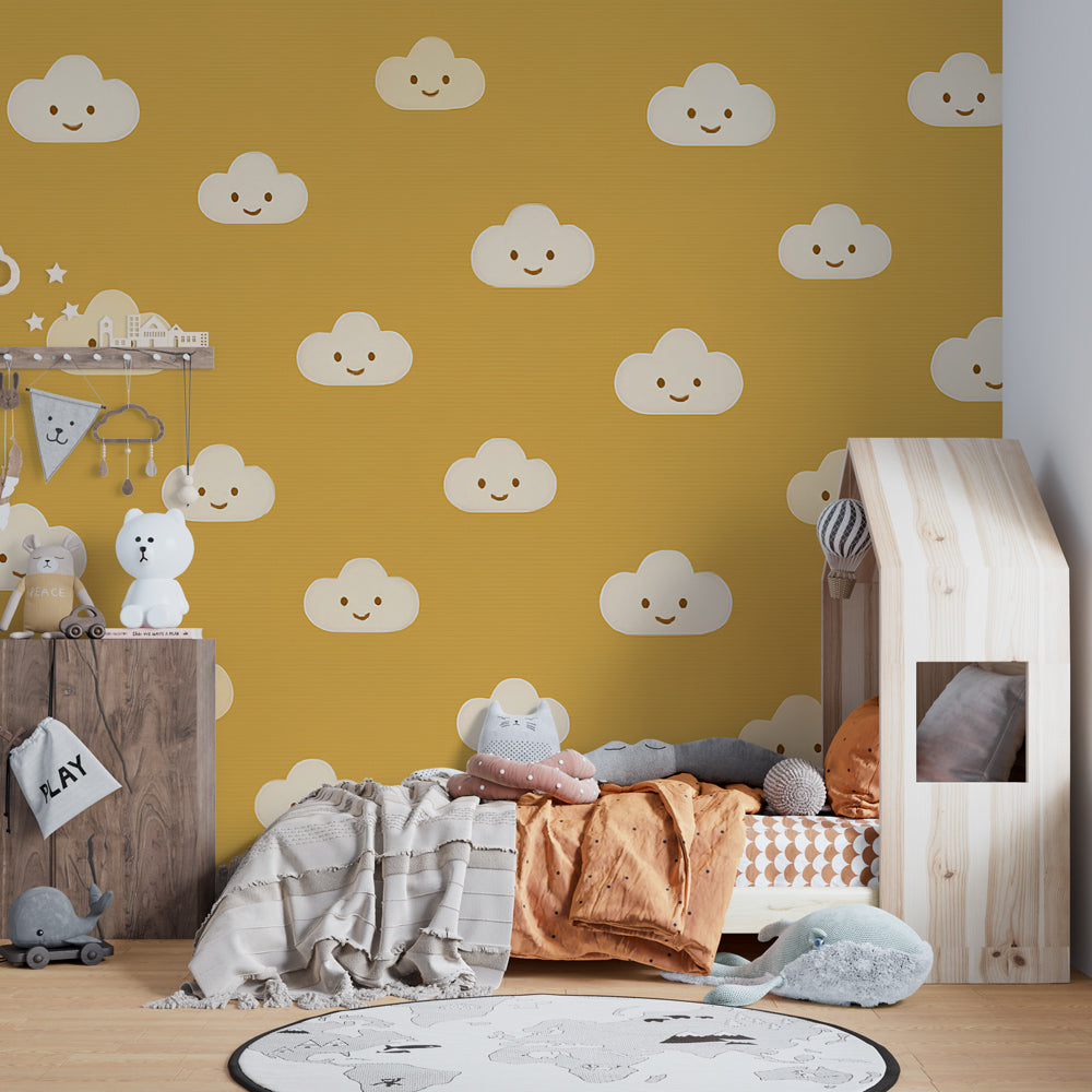 Golden clouds wallpaper creating cheerful atmosphere in children's bedroom with wooden furniture