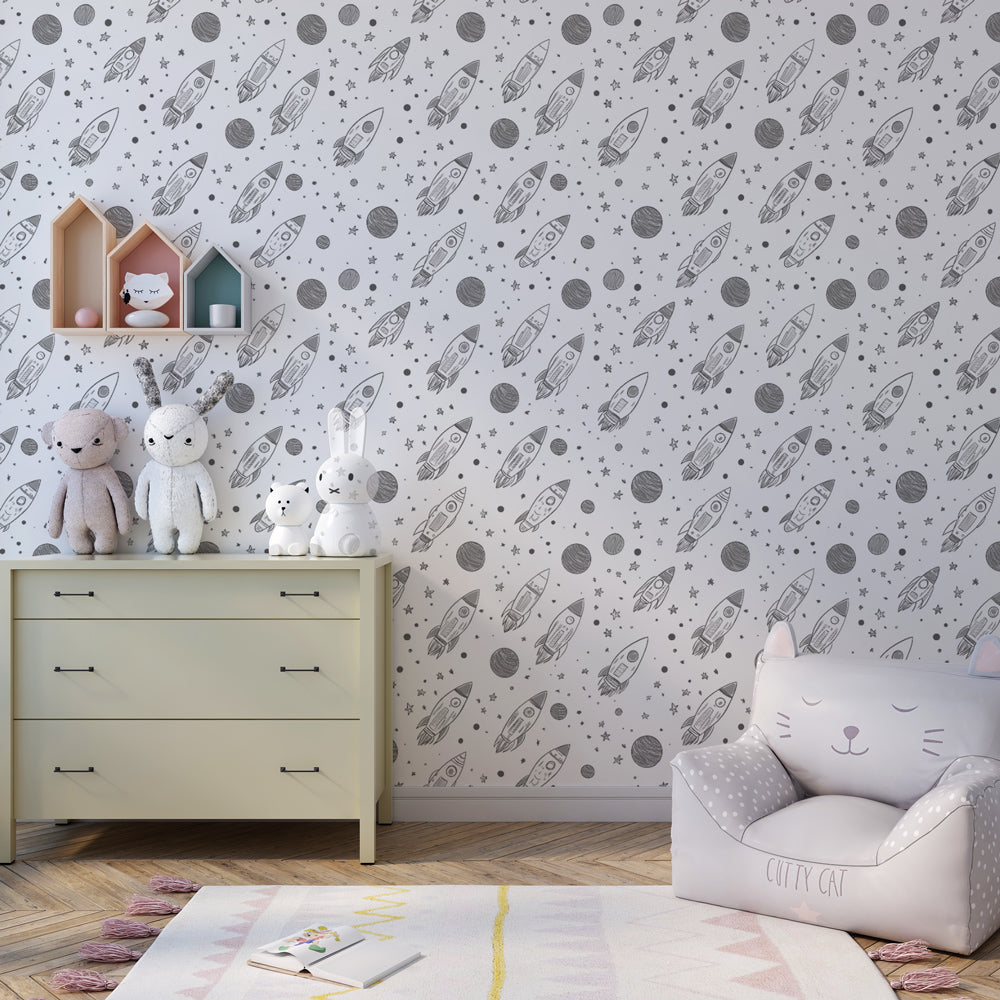 Grey rocket and planet wallpaper decorating modern kids bedroom with space theme