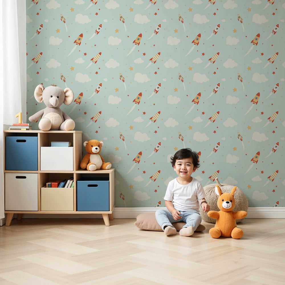 Space rocket mural wallpaper creating adventurous nursery decor with colorful rockets and clouds by Kids-Mundo