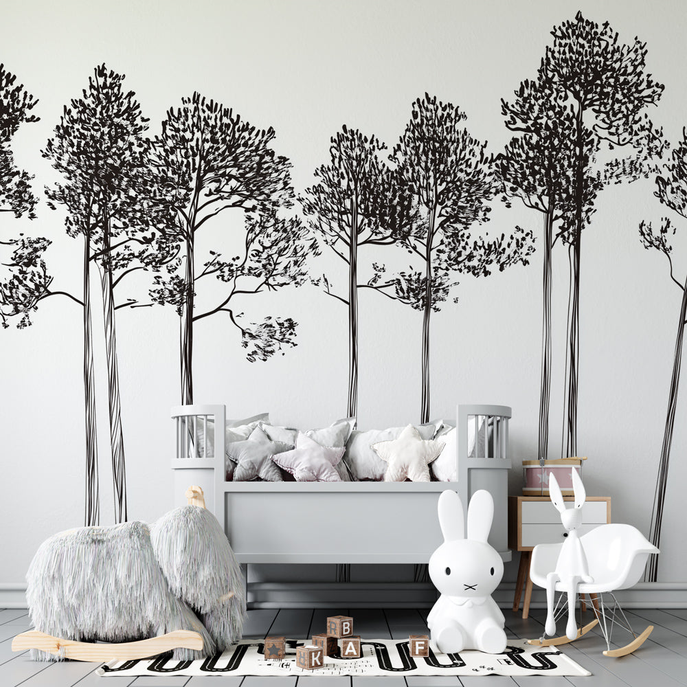 Forest tree wallpaper creating serene atmosphere in kids bedroom with natural decor