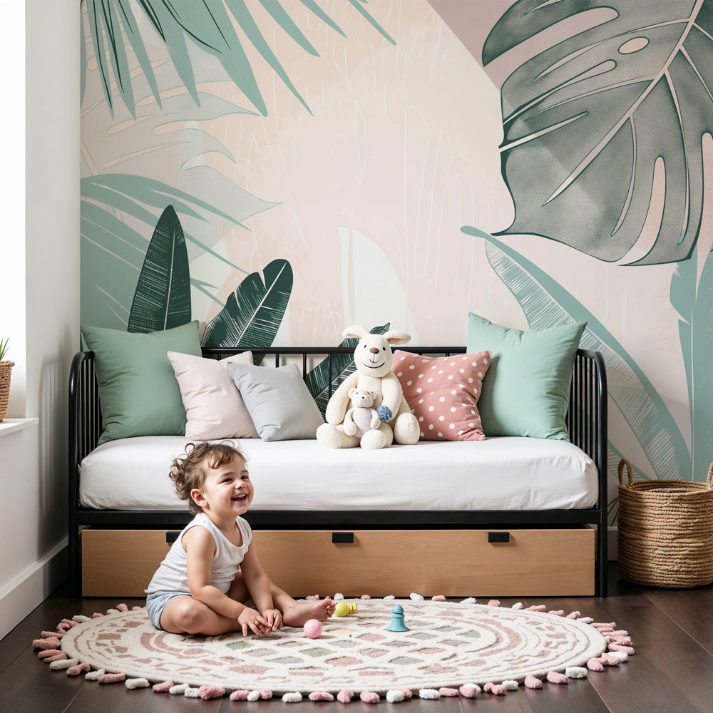 Tropical leaves mural wallpaper in soft pastels decorating modern nursery by Kids-Mundo