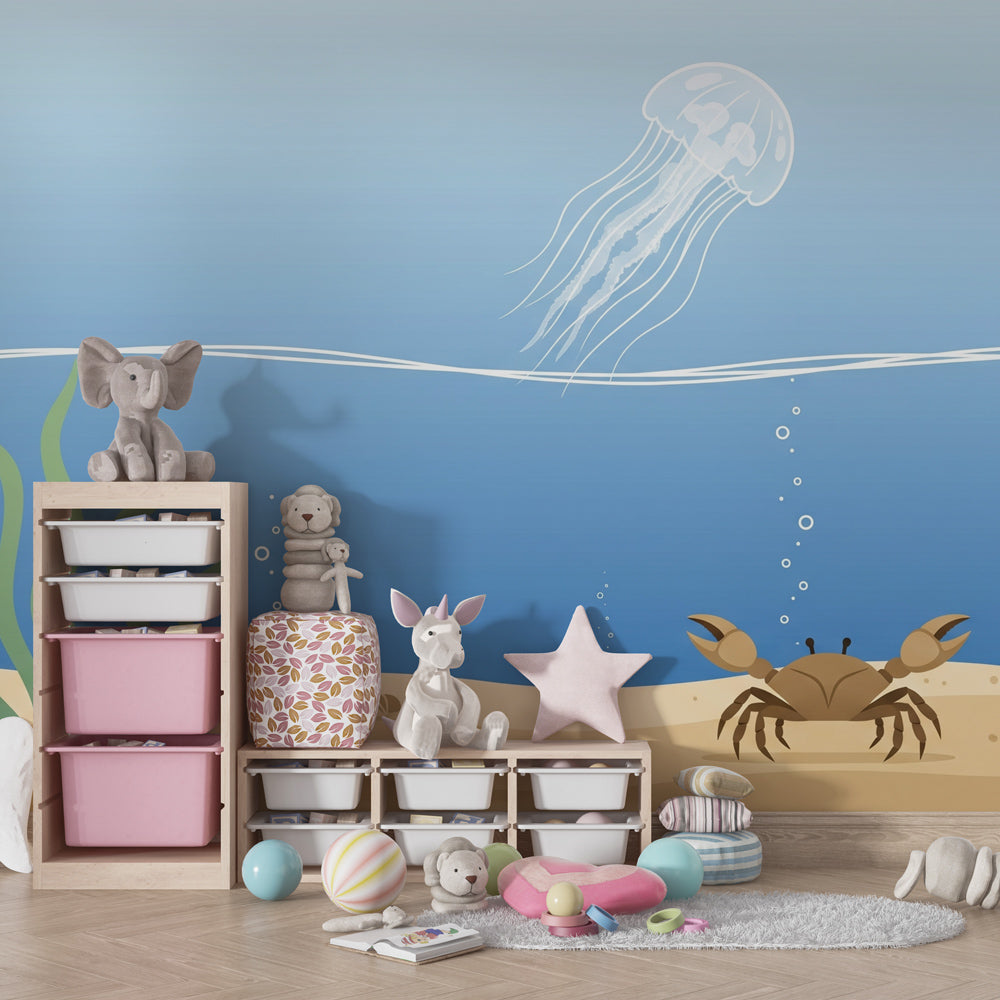 Underwater theme mural wallpaper creating serene ocean atmosphere in children's bedroom