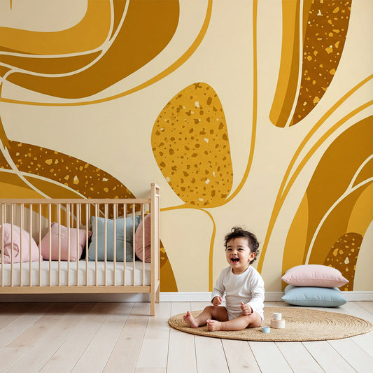 Kids-Mundo abstract golden swirls wall mural above a cot in a warm-toned nursery