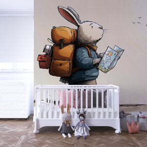 Explorer rabbit wallpaper creating adventure themed kids bedroom with natural wood furniture