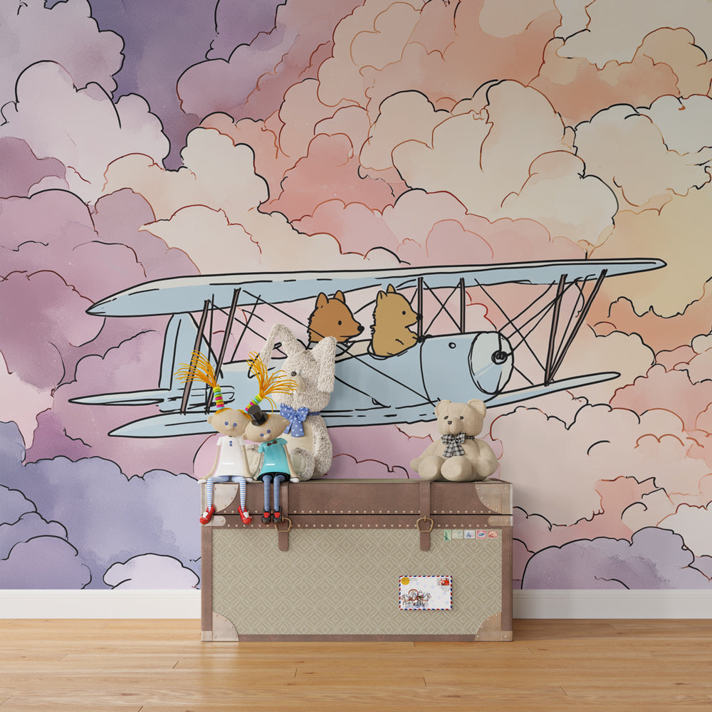 Children's bedroom featuring airplane mural wallpaper with cute animals in pastel cloudscape by Kids-Mundo