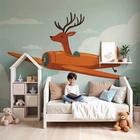 Airplane adventure mural wallpaper with flying deer in modern nursery room by Kids-Mundo