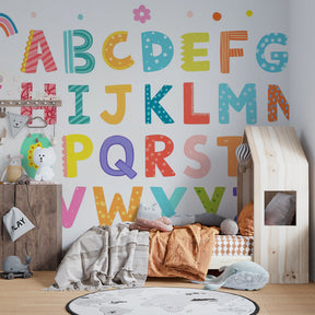 ABC learning wallpaper in bright toddler bedroom with playful educational design by Kids-Mundo