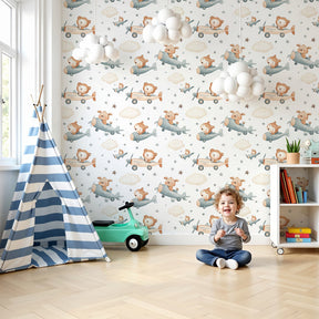 Animal airplane mural wallpaper creating magical nursery with flying lions and puppies by Kids-Mundo