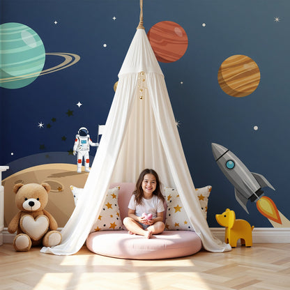 Kids-Mundo astronaut space wall mural styled above a cot, with planets and a rocket launch in a nursery