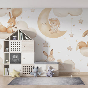 Baby nursery featuring gentle animal cloud wallpaper in soft beige tones by Kids-Mundo