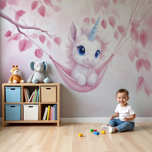 Kids-Mundo baby unicorn wall mural above a white cot in a soft pink nursery room