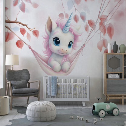 Kids-Mundo baby unicorn wall mural adding gentle charm to a soft pastel playroom corner.