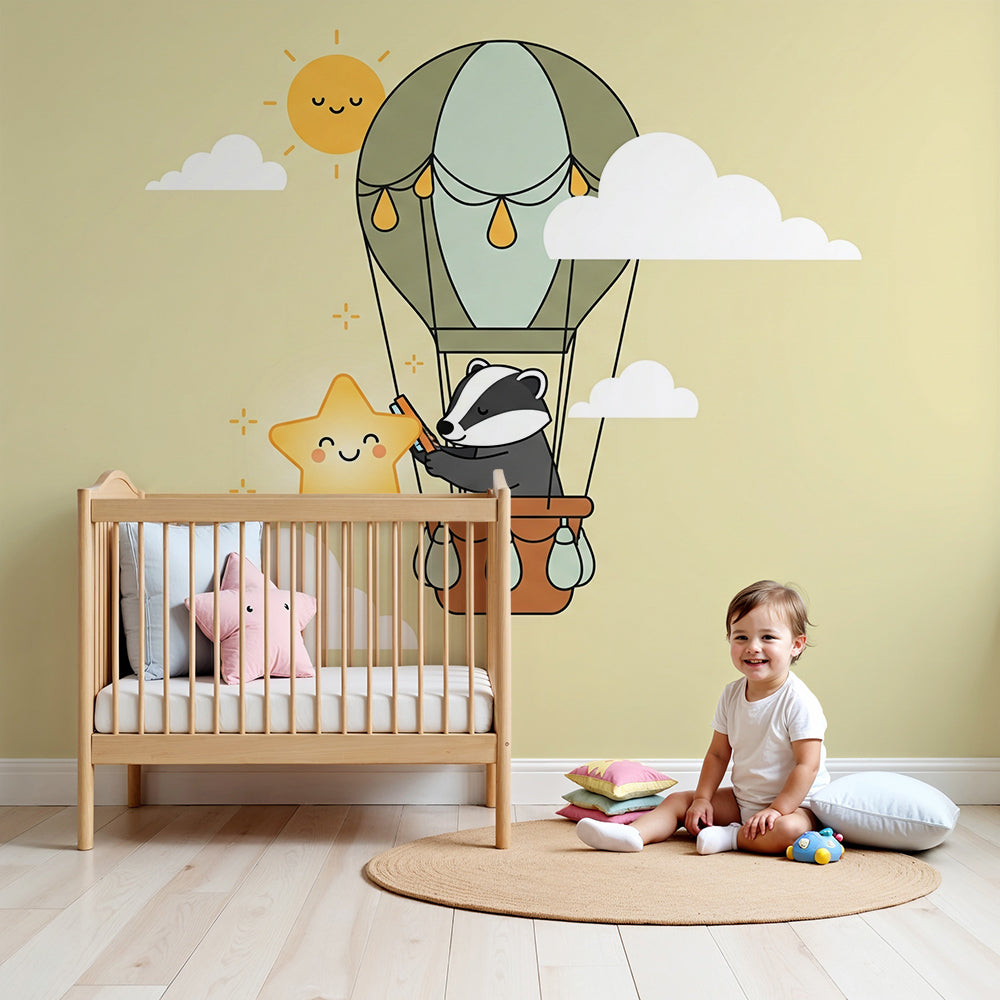 Kids-Mundo badger hot air balloon wall mural styled in a soft yellow nursery