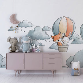 Adventure balloon mural wallpaper transforming kids playroom with dreamy cloud design
