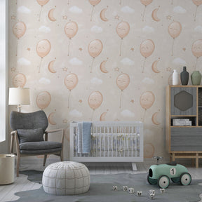 Whimsical balloon and cloud mural wallpaper transforming kids playroom into dreamy space
