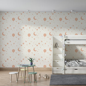 Dreamy balloon wallpaper with moons and stars transforming children's room decor