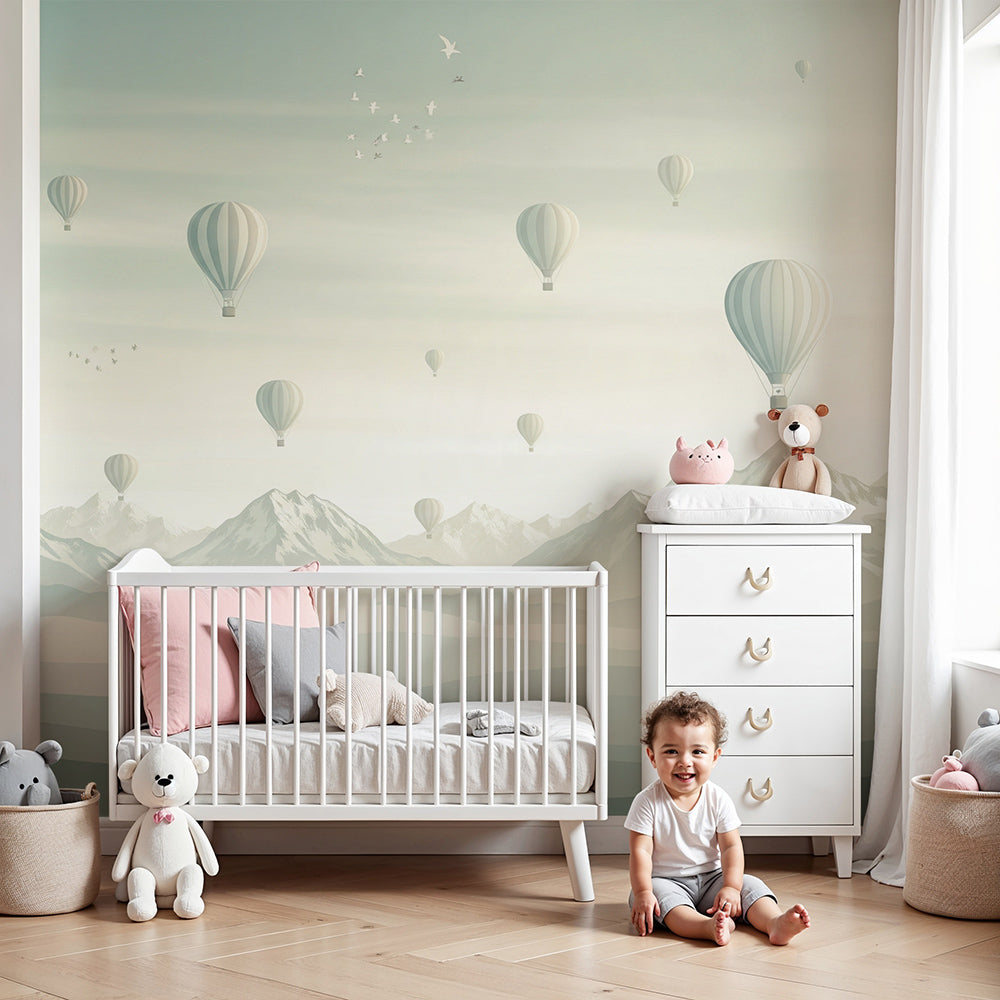 Kids-Mundo hot air balloon wall mural drifting over misty mountains in a soft nursery