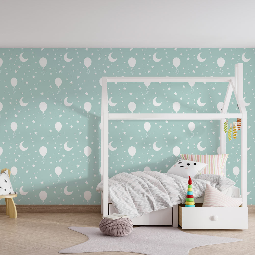 Dreamy balloon wallpaper creating peaceful children's bedroom with mint green backdrop