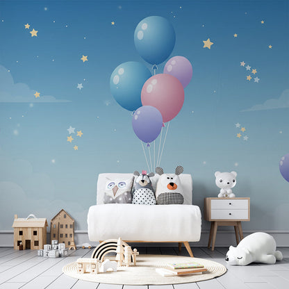 Kids-Mundo starry balloon mural on a feature wall in a soft blue kids bedroom
