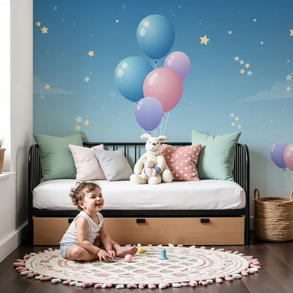 Kids-Mundo balloon wall mural above a cot in a calm starry night nursery room