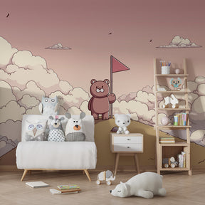 Pastel bear mural wallpaper with clouds in cozy kids room setting by Kids-Mundo