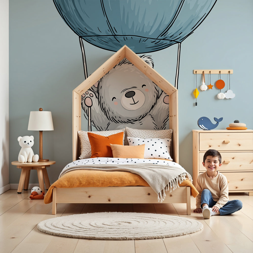 Bear hot air balloon mural wallpaper in modern nursery with natural wood crib by Kids-Mundo