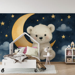 Adorable bear on crescent moon wallpaper behind wooden crib in peaceful nursery setting