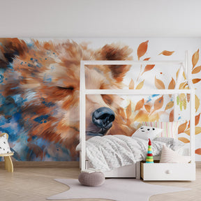Gentle bear mural wallpaper in toddler room setting with playful accessories and natural textures