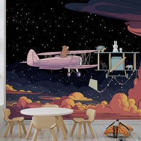 Sky adventure mural wallpaper featuring bear pilot in children's bedroom decor setup